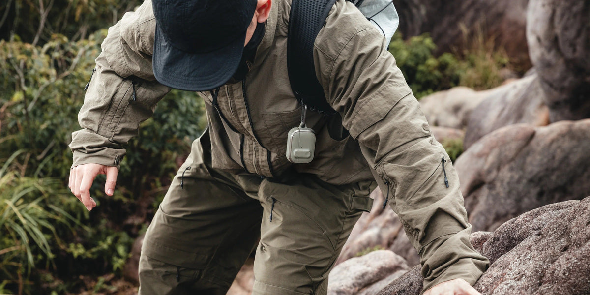MAGEASY Odyssey outdoor AirPods Pro 3 case opened in hand to show quick access to AirPods