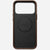 nomad leather case for iphone 17 pro brown in-hand photo